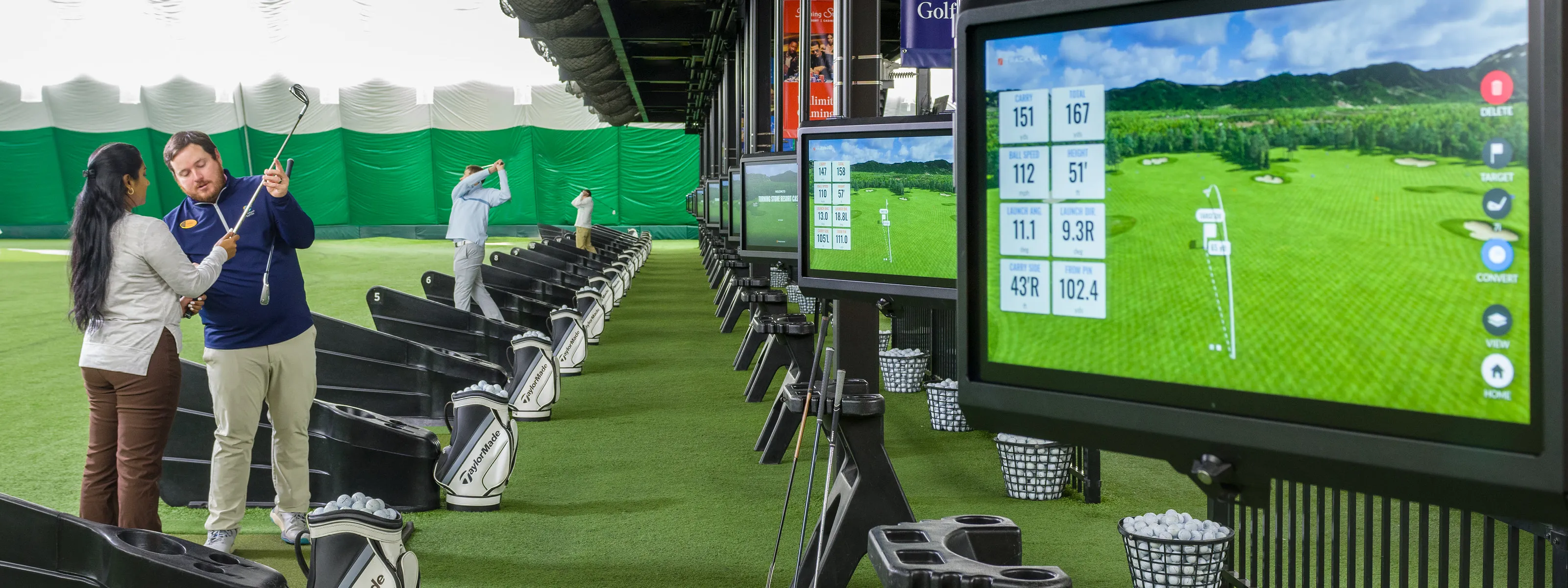 Flower lined entrance to the Sportsplex for golf, tennis, and racquetball at Turning Stone