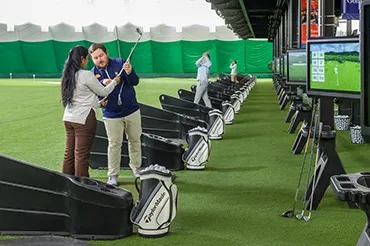 Golfers on a putting green
